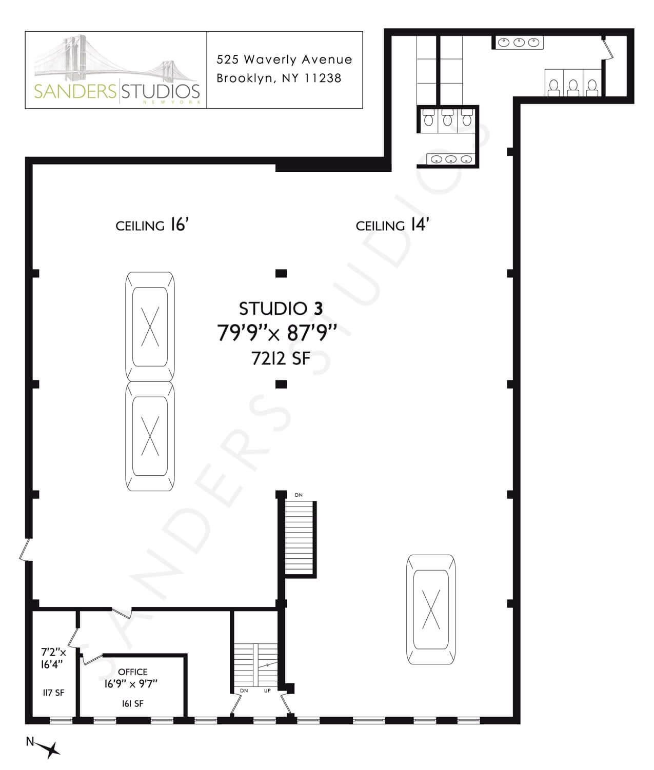 A floor plan of a studio apartment with a lot of furniture.