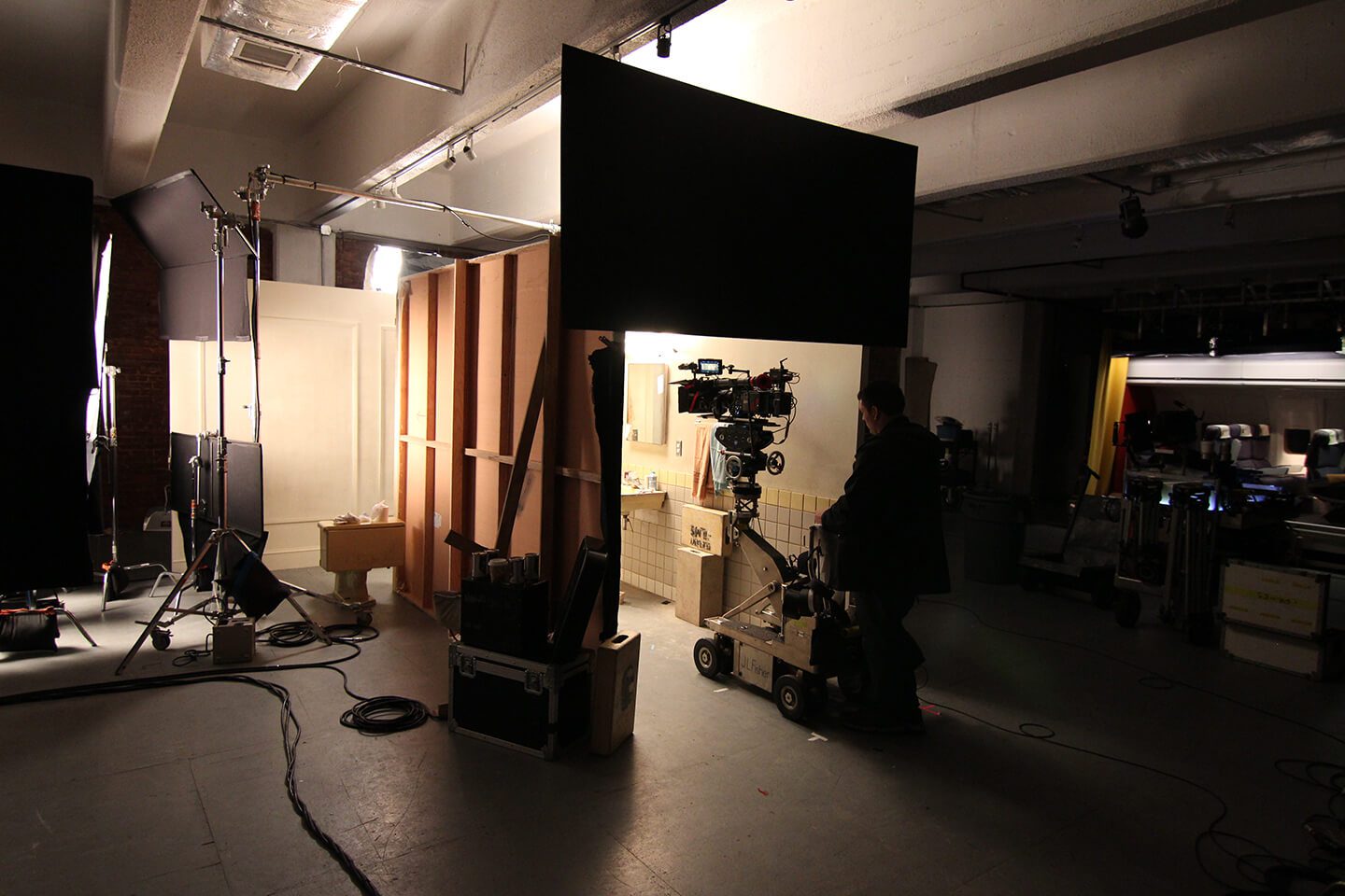 A man is filming in the studio