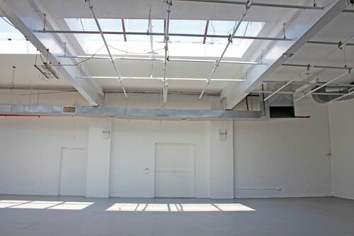 A large room with white walls and ceiling.