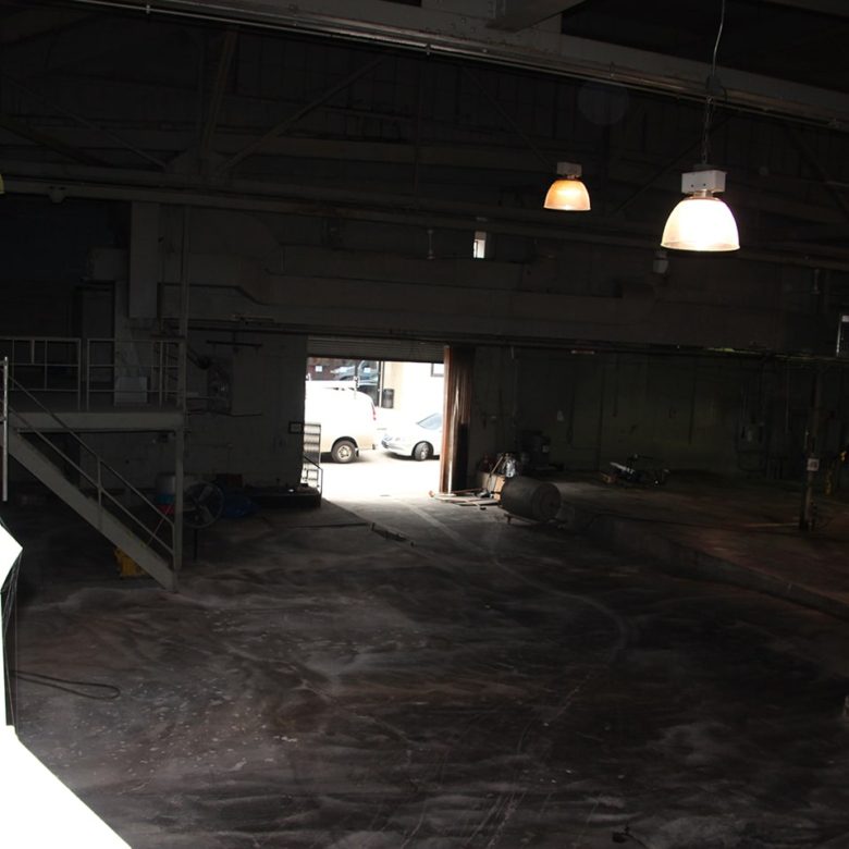 A view of an empty garage from the ground floor.